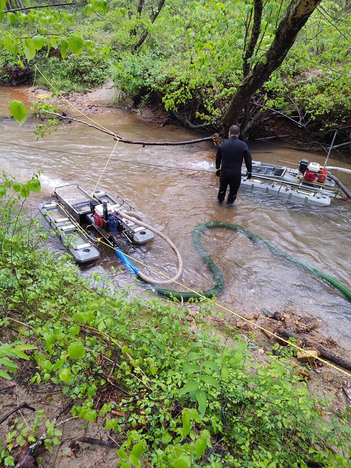 Gold dredging on the creek